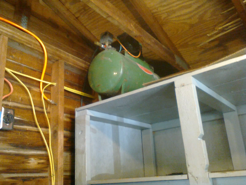 If I ever get around to upgrading the compressor, I can cut away part of the shelving unit and put it in the same place. And if that upgrade needs 220VAC, there’s a brand new plug nearby ready for it.
